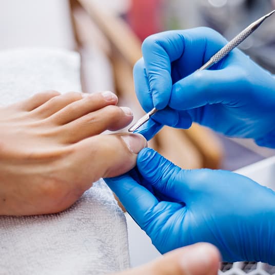 Doctor at The One Clinic Leicester consulting a patient about ingrown toenail removal